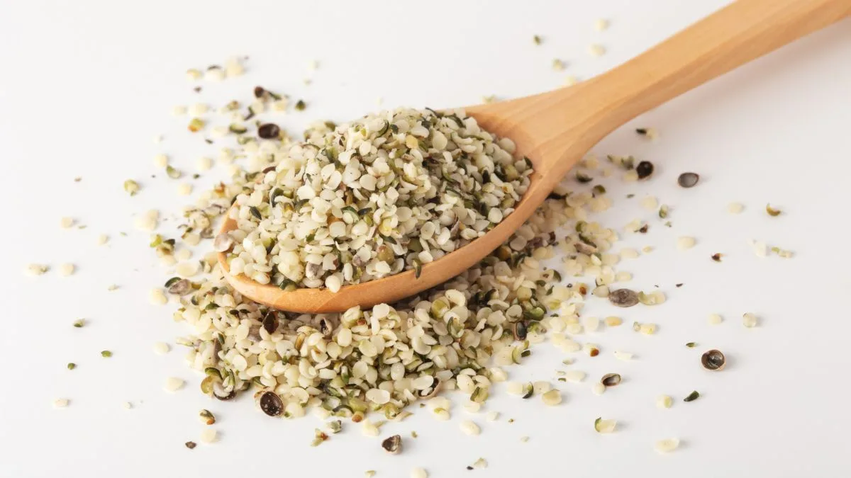 Hemp seeds on a wooden spoon